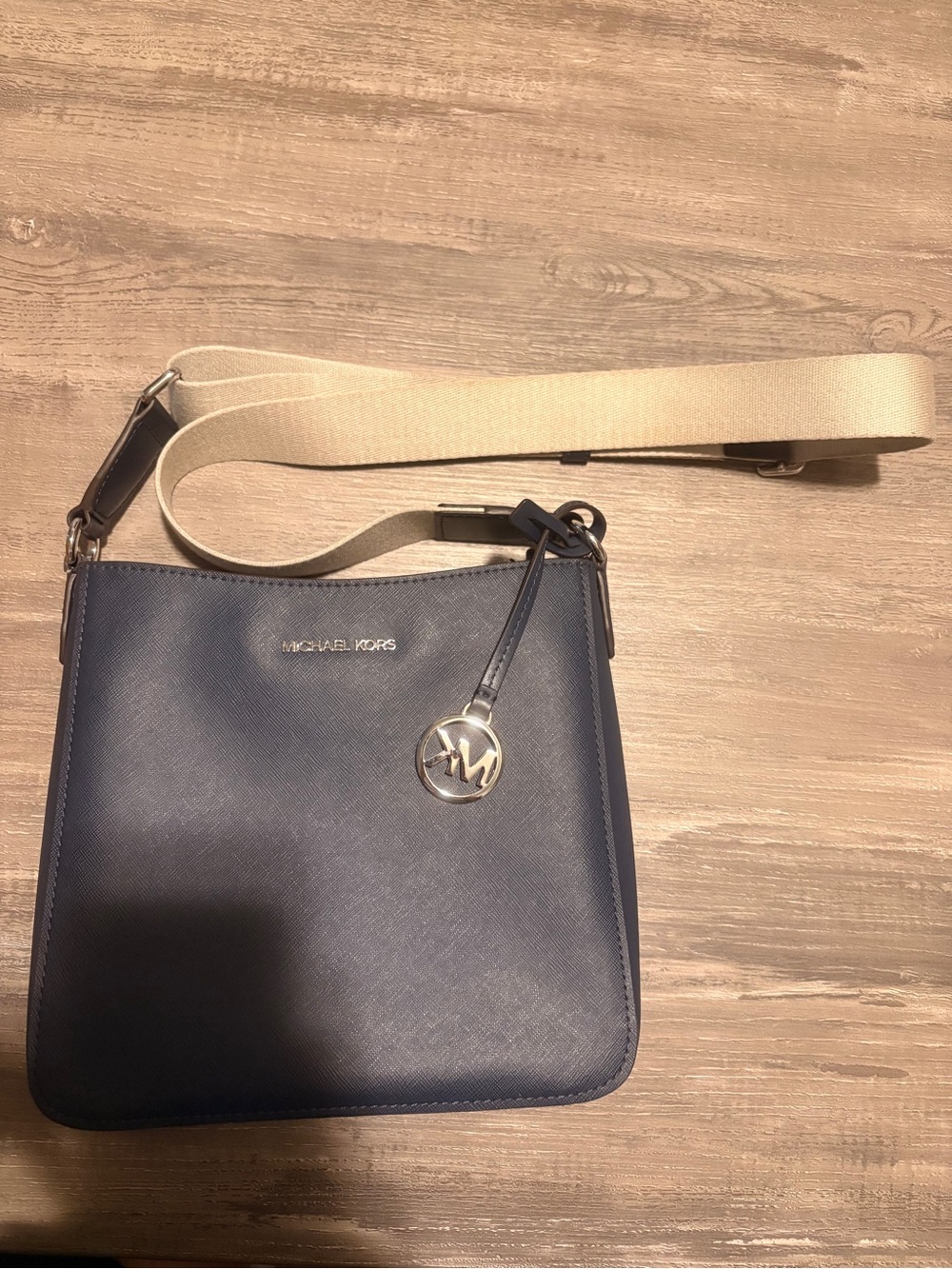 MICHAEL KORS Navy Crossbody with Cream Strap and Silver Logo Charm